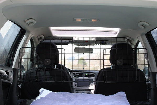 Dog Car Barrier vs. Crate: Which Is Better? Dog Car Barrier vs. Crate: Which Is Better?